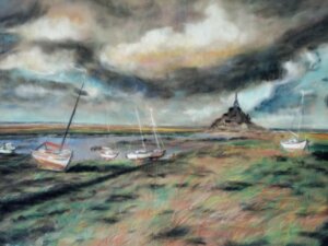 Vue de Mont St Michel avec des voiliers devant